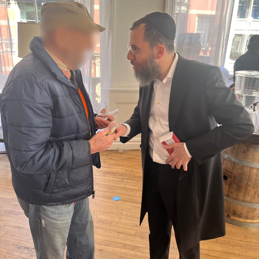 Holding Matzah Sandwich